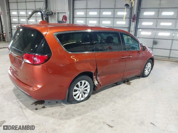 2018 Chrysler Pacifica Touring Plus with VIN 2C4RC1FG6JR289823, listed as a IAAI auction lot 41812949 with 153,035 mi miles. Bid and sale history available at carsss.com. Image 4.