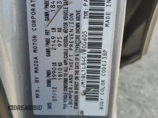 2012 Mazda 3 i Touring with VIN JM1BL1L84C1700805, listed as a Copart auction lot 61865075 with 77,538 mi miles and Salvage title. Bid and sale history available at DreamBid. Image 14.
