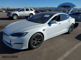 2022 Tesla Model S Plaid with VIN 5YJSA1E64NF479959, listed as a IAAI auction lot 41057673 with 27,203 mi miles. Bid and sale history available at carsss.com. Image 2.