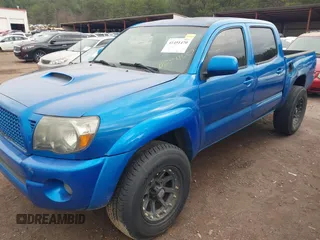 2009 Toyota Tacoma PreRunner with VIN 3TMJU62N89M086883, listed as a IAAI auction lot 41451470 with 226,002 mi miles. Bid and sale history available at carsss.com. Image 2.