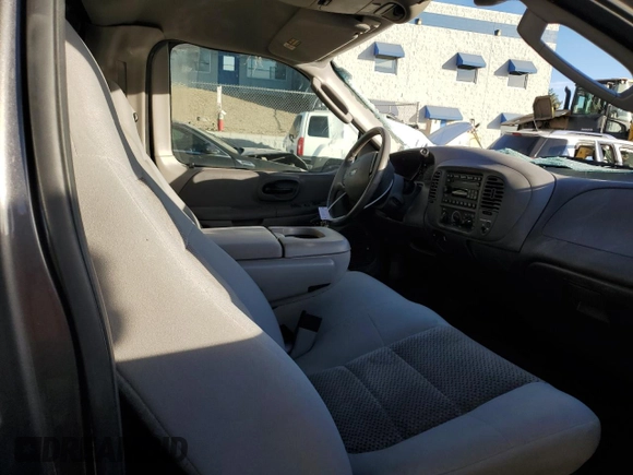 2003 Ford F-150 XL with VIN 1FTRF072X3KC94240, listed as a Copart auction lot 86130954 with 101,042 mi miles and Salvage title. Bid and sale history available at DreamBid. Image 10.