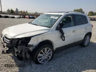 2015 Volkswagen Tiguan SEL with VIN WVGAV7AX4FW509990, listed as a Copart auction lot 76289084 with 95,635 mi miles and Salvage title. Bid and sale history available at DreamBid. Image 1.