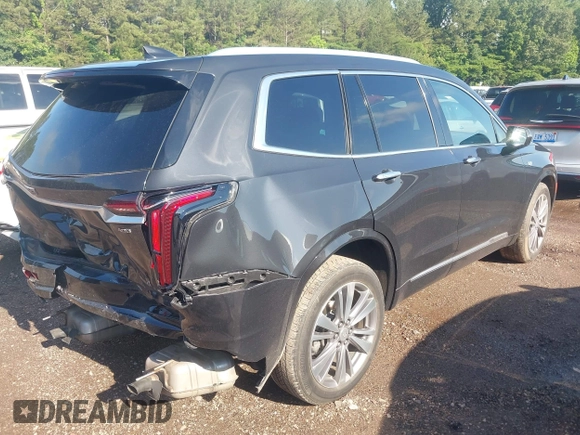 2020 Cadillac XT6 FWD Premium Luxury with VIN 1GYKPCRS0LZ206567, listed as a IAAI auction lot 42254511 with 80,443 mi miles and . Bid and sale history available at DreamBid. Image 4.