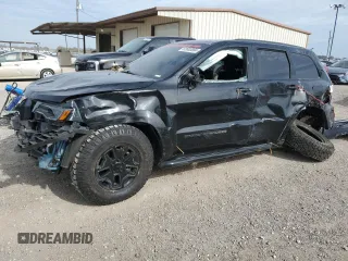 2018 Jeep Grand Cherokee High Altitude z VIN 1C4RJECG3JC124791, wystawiony jako Copart lot #82000884 z przebiegiem Nie podano mil oraz Szkoda całkowita • Salvage title. Historia ofert i sprzedaży dostępna na DreamBid. Obrazek 1.