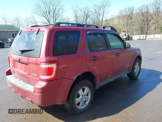 2008 Ford Escape XLT with VIN 1FMCU93108KC15674, listed as a IAAI auction lot 42049019 with 180,077 mi miles. Bid and sale history available at carsss.com. Image 4.