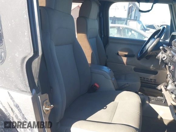 2004 Jeep Wrangler Sahara with VIN 1J4FA59S94P731123, listed as a IAAI auction lot 41288284 with 138,515 mi miles and . Bid and sale history available at DreamBid. Image 5.