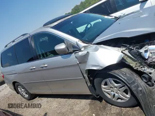 2007 Honda Odyssey EX-L z VIN 5FNRL38667B453060, wystawiony jako IAAI lot #42066637 z przebiegiem 184 439 mil mil oraz . Historia ofert i sprzedaży dostępna na DreamBid. Obrazek 13.