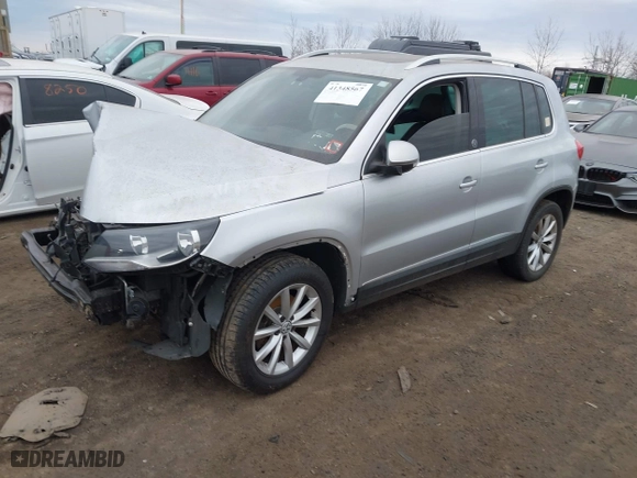2017 Volkswagen Tiguan Wolfsburg Edition with VIN WVGSV7AX8HK031345, listed as a IAAI auction lot 41348567 with 130,313 mi miles. Bid and sale history available at carsss.com. Image 20.