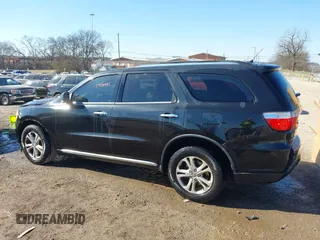 2013 Dodge Durango Crew with VIN 1C4SDHDT3DC553939, listed as a IAAI auction lot 41404491 with 148,505 mi miles and . Bid and sale history available at carsss.com. Image 14.