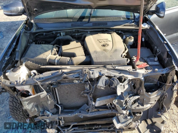 2019 Toyota Tacoma SR z VIN 3TMCZ5AN4KM273999, wystawiony jako Copart lot #55942135 z przebiegiem 101 513 mil mil oraz Szkoda całkowita • Salvage title. Historia ofert i sprzedaży dostępna na DreamBid. Obrazek 11.