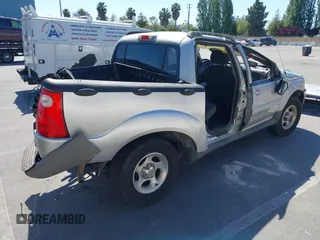 2005 Ford Explorer Sport Trac XLS z VIN 1FMDU67K25UA01209, wystawiony jako IAAI lot #39448448 z przebiegiem Nie podano mil oraz . Historia ofert i sprzedaży dostępna na DreamBid. Obrazek 4.