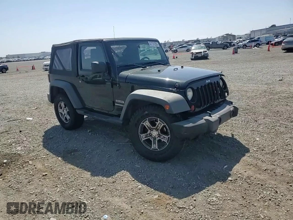 2012 Jeep Wrangler Sport z VIN 1C4AJWAG9CL257841, wystawiony jako Copart lot #57731255 z przebiegiem 112 614 mil mil oraz Szkoda całkowita • Salvage title. Historia ofert i sprzedaży dostępna na DreamBid. Obrazek 13.