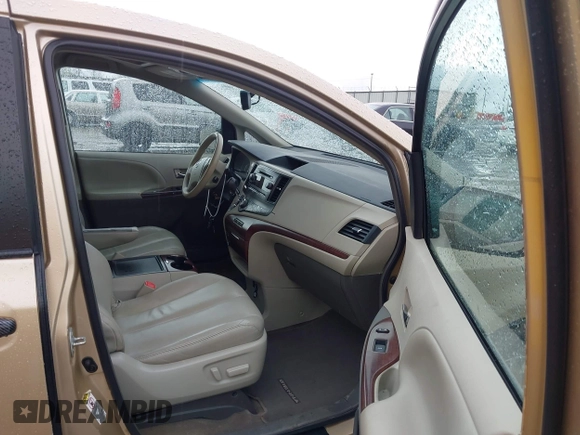 2014 Toyota Sienna XLE with VIN 5TDYK3DC1ES416999, listed as a IAAI auction lot 41972378 with 119,179 mi miles. Bid and sale history available at carsss.com. Image 5.