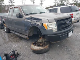 2013 Ford F-150 XL with VIN 1FTEX1CM5DFB69715, listed as a IAAI auction lot 41259318 with 176,916 mi miles. Bid and sale history available at carsss.com. Image 1.