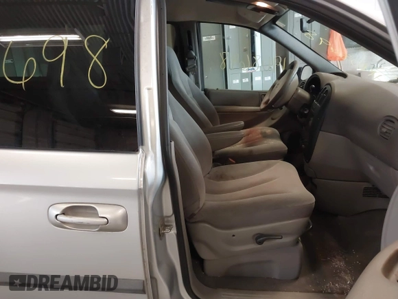 2003 Dodge Grand Caravan with VIN 2D4GP44353R166193, listed as a IAAI auction lot 41908698 with 181,371 mi miles and . Bid and sale history available at DreamBid. Image 5.