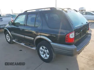 2002 Isuzu Rodeo S with VIN 4S2CK58WX24339782, listed as a IAAI auction lot 41340277 with 154,240 mi miles. Bid and sale history available at carsss.com. Image 3.