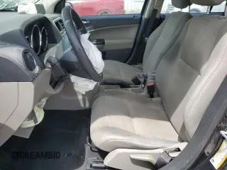 2010 Dodge Caliber Mainstreet z VIN 1B3CB3HAXAD581878, wystawiony jako Copart lot #55808835 z przebiegiem 168 858 mil mil oraz Szkoda całkowita • Salvage title. Historia ofert i sprzedaży dostępna na DreamBid. Obrazek 7.