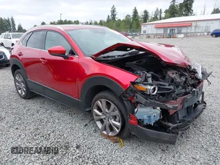 2021 Mazda CX-30 Premium with VIN 3MVDMBDM7MM213754, listed as a IAAI auction lot 42509691 with 61,230 mi miles and . Bid and sale history available at DreamBid. Image 1.