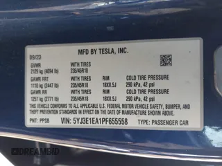 2023 Tesla Model 3 with VIN 5YJ3E1EA1PF655558, listed as a IAAI auction lot 41668827 with 68,778 mi miles and . Bid and sale history available at carsss.com. Image 9.