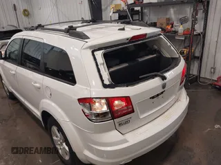 2009 Dodge Journey SXT z VIN 3D4GG57V09T582922, wystawiony jako IAAI lot #42248003 z przebiegiem 138 059 mil mil oraz . Historia ofert i sprzedaży dostępna na DreamBid. Obrazek 6.