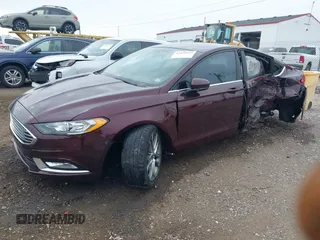 2017 Ford Fusion SE with VIN 3FA6P0HD9HR222003, listed as a IAAI auction lot 42498814 with 113,236 mi miles and . Bid and sale history available at DreamBid. Image 2.