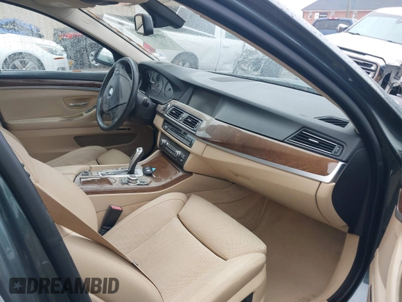 2012 BMW 5 Series 528i with VIN WBAXG5C53CDY28309, listed as a IAAI auction lot 41064233 with 129,915 mi miles. Bid and sale history available at carsss.com. Image 5.