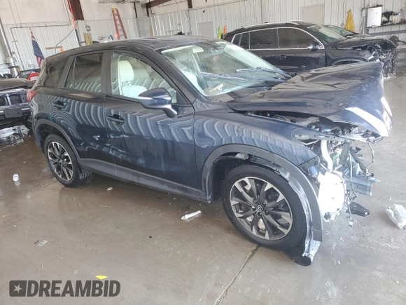 2016 Mazda CX-5 Grand Touring with VIN JM3KE4DY7G0735576, listed as a Copart auction lot 41916395 with 0 mi miles and Non Repairable. Bid and sale history available at carsss.com. Image 4.