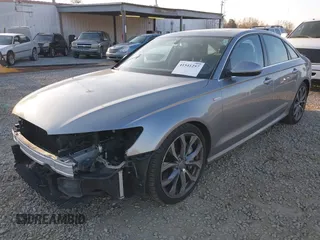 2015 Audi A6 Premium Plus z VIN WAUFGAFCXFN004840, wystawiony jako IAAI lot #41541257 z przebiegiem 163 050 mil mil oraz . Historia ofert i sprzedaży dostępna na DreamBid. Obrazek 2.