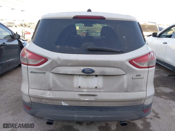 2014 Ford Escape SE with VIN 1FMCU0GX8EUB31399, listed as a IAAI auction lot 41795927 with 129,963 mi miles. Bid and sale history available at carsss.com. Image 16.