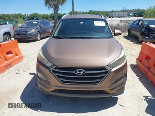 2016 Hyundai Tucson Sport with VIN KM8J33A29GU054909, listed as a IAAI auction lot 41835688 with 90,751 mi miles. Bid and sale history available at carsss.com. Image 12.