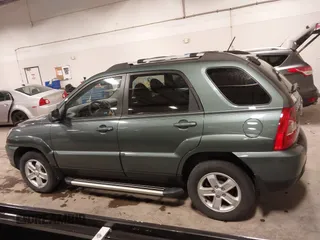 2009 Kia Sportage LX with VIN KNDJE723097558182, listed as a IAAI auction lot 41295142 with 147,200 mi miles. Bid and sale history available at carsss.com. Image 15.