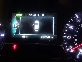 2015 Kia Optima with VIN KNAGM4AD8F5087991, listed as a IAAI auction lot 42286830 with 157,047 mi miles and . Bid and sale history available at DreamBid. Image 7.