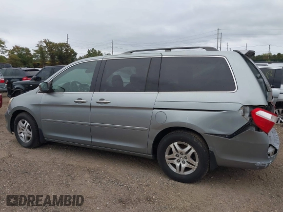 2005 Honda Odyssey EX-L with VIN 5FNRL38625B041067, listed as a IAAI auction lot 40519464 with 117,606 mi miles and . Bid and sale history available at carsss.com. Image 3.