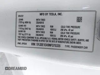 2022 Tesla Model 3 with VIN 5YJ3E1EA9NF375335, listed as a IAAI auction lot 41676024 with 18,836 mi miles. Bid and sale history available at carsss.com. Image 9.