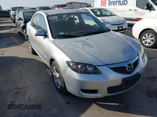 2007 Mazda Mazda3 i Sport with VIN JM1BK12F071721580, listed as a IAAI auction lot 42018938 with 141,801 mi miles. Bid and sale history available at carsss.com. Image 1.