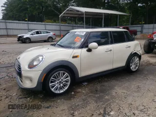 2016 MINI Hardtop 4 Door z VIN WMWXU1C52G2D10925, wystawiony jako Copart lot #62390205 z przebiegiem 100 338 mil mil oraz Szkoda całkowita • Salvage title. Historia ofert i sprzedaży dostępna na DreamBid. Obrazek 1.