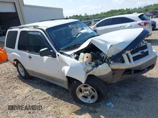 2003 Ford Explorer Sport XLS with VIN 1FMYU60E73UB25883, listed as a IAAI auction lot 42613001 with 212,584 mi miles and . Bid and sale history available at DreamBid. Image 1.