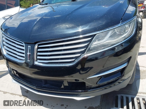 2017 Lincoln MKC Premiere with VIN 5LMCJ1C96HUL03694, listed as a IAAI auction lot 42755891 with 75,686 mi miles and . Bid and sale history available at DreamBid. Image 6.