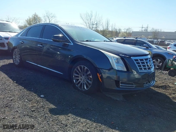2013 Cadillac XTS Luxury with VIN 2G61R5S37D9102425, listed as a IAAI auction lot 42059995 with 174,901 mi miles. Bid and sale history available at carsss.com. Image 1.