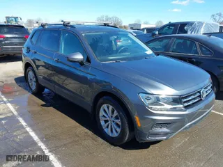 2018 Volkswagen Tiguan S with VIN 3VV1B7AX3JM058106, listed as a IAAI auction lot 41733458 with 164,268 mi miles. Bid and sale history available at carsss.com. Image 1.