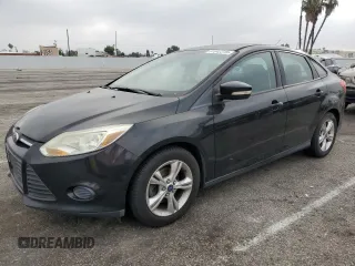 2013 Ford Focus SE with VIN 1FADP3F20DL335132, listed as a Copart auction lot 61042315 with 149,443 mi miles and Clean title. Bid and sale history available at DreamBid. Image 1.