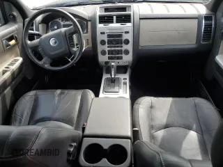 2009 Mercury Mariner Premier z VIN 4M2CU97G29KJ15705, wystawiony jako Copart lot #58233215 z przebiegiem 129 589 mil mil oraz Szkody całkowita. Historia ofert i sprzedaży dostępna na DreamBid. Obrazek 8.