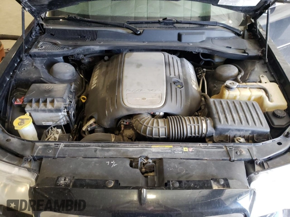 2005 Chrysler 300 C z VIN 2C3JA63H55H119210, wystawiony jako Copart lot #54727045 z przebiegiem 148 202 mil mil oraz Szkoda całkowita • Salvage title. Historia ofert i sprzedaży dostępna na DreamBid. Obrazek 11.