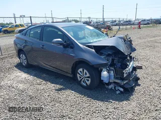 2018 Toyota Prius Two with VIN JTDKBRFU3J3593130, listed as a IAAI auction lot 42402887 with 58,469 mi miles and . Bid and sale history available at DreamBid. Image 1.