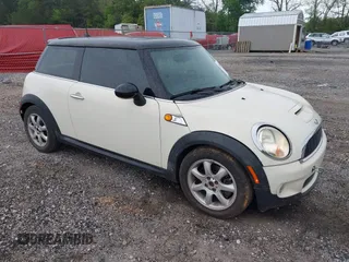 2007 MINI Hardtop S with VIN WMWMF73557TL91653, listed as a IAAI auction lot 42095562 with 113,860 mi miles and . Bid and sale history available at DreamBid. Image 1.