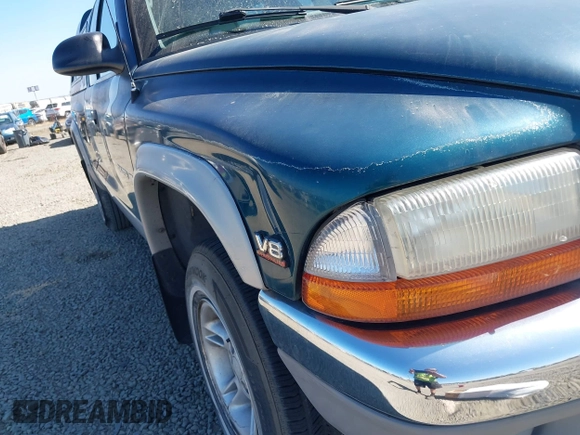 1999 Dodge Dakota SLT with VIN 1B7GG22Y2XS157214, listed as a IAAI auction lot 39776504 with 144,928 mi miles and . Bid and sale history available at carsss.com. Image 6.