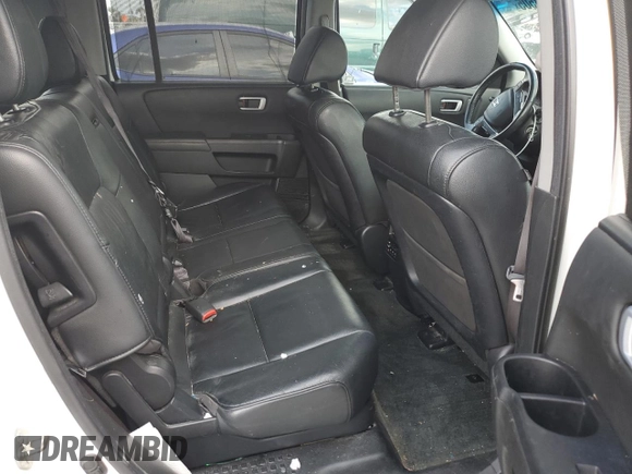 2013 Honda Pilot Touring z VIN 5FNYF3H9XDB044620, wystawiony jako Copart lot #58038505 z przebiegiem 172 096 mil mil oraz Szkoda całkowita • Salvage title. Historia ofert i sprzedaży dostępna na DreamBid. Obrazek 11.