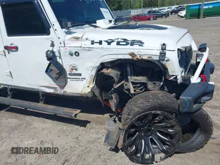 2017 Jeep Wrangler Unlimited Rubicon with VIN 1C4BJWFG9HL695361, listed as a IAAI auction lot 42010655 with 65,536 mi miles and . Bid and sale history available at DreamBid. Image 6.