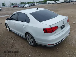 2017 Volkswagen Jetta GLI z VIN 3VW4T7AJ8HM349440, wystawiony jako IAAI lot #42491919 z przebiegiem 141 764 mil mil oraz . Historia ofert i sprzedaży dostępna na DreamBid. Obrazek 3.