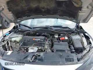 2019 Honda Civic LX with VIN 19XFC2F60KE043806, listed as a IAAI auction lot 41915894 with 123,141 mi miles and . Bid and sale history available at DreamBid. Image 10.